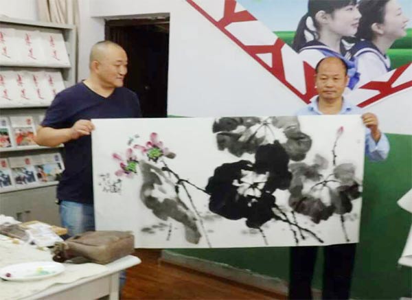 民盟武都區總支部-盟員書畫家進校園-翰墨飄香傳播文明260xg.jpg